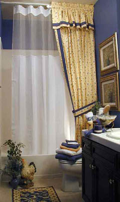 picture- bathtub with ceiling mounted shower rod track and decorative curtain